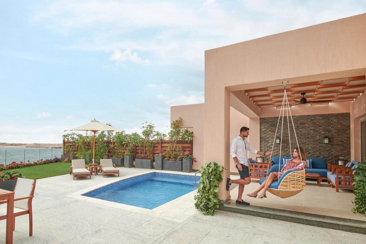 Four Seasons Hotel Alexandria At San Stefano Buitenkant foto A pool at the resort
